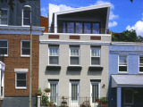 Row House Features DC's First Solar Chimney