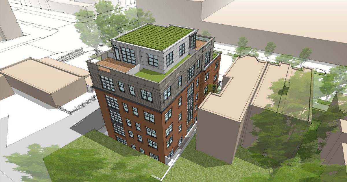 View of Historic Apartment Building Under Pale Sky Ornate Cornices ... - Alamy