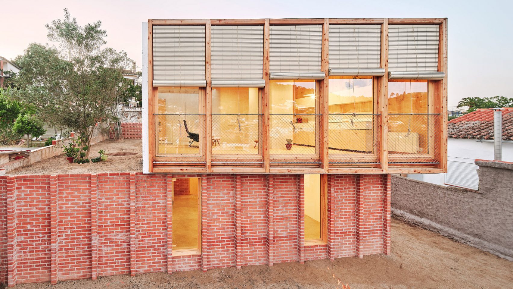 house-on-a-brick-base-agora-arquitectura-architecture-residential-renovations-spain-barcelona_dezeen_2364_hero-1704x959.jpeg