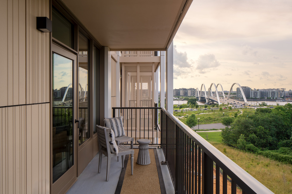 BridgeDistrict_INT_Apartments_ModelBalcony_SeamusPayne_072025.jpg